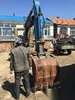 黑龙江牡丹江本人出售二手轮式挖掘机因转行车在家中放了三年