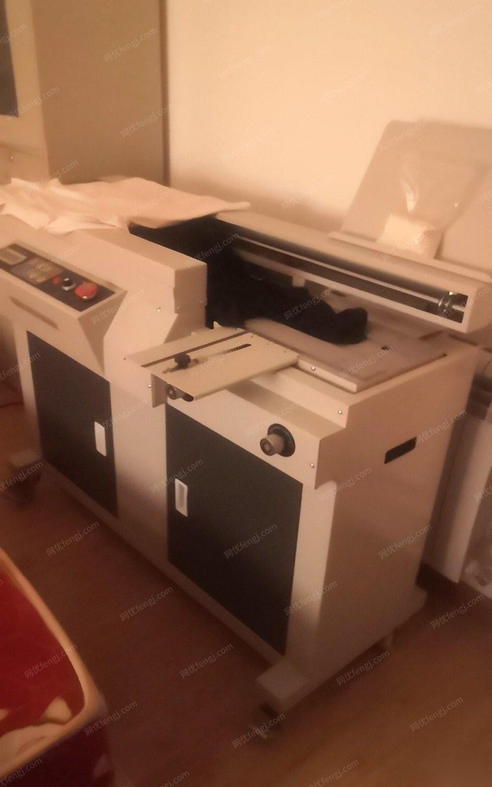 西藏拉萨9成新全自动胶装机和切纸机 15000元出售