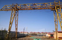 甘肃张掖出售二手闲置10吨龙门吊 ,全长23米，内跨13米，两侧各外悬五米。道轨是38道轨，总长度87.5米