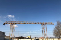 黑龙江哈尔滨不用了出售闲置未拆2台10吨龙门吊架 高度11米 配有轨道130米。5吨9米电动葫芦2个,看货议价.打包卖