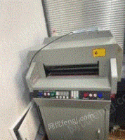 河南驻马店9成新激光切纸机和胶装机出售