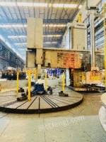 德国重机西斯14米单柱数控立式车铣镗复合加工中心：SCHIESS63DFG—加工直径14米，工作台直径7米承重200吨，地平板二块2.5米X5米，X轴9米，Y轴加工高度5.6米，刀架上下行程2.8米，