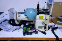 内蒙古呼和浩特工业用电动缝纫机，密边机，电熨斗，烫台，衣镜低价整体出售 