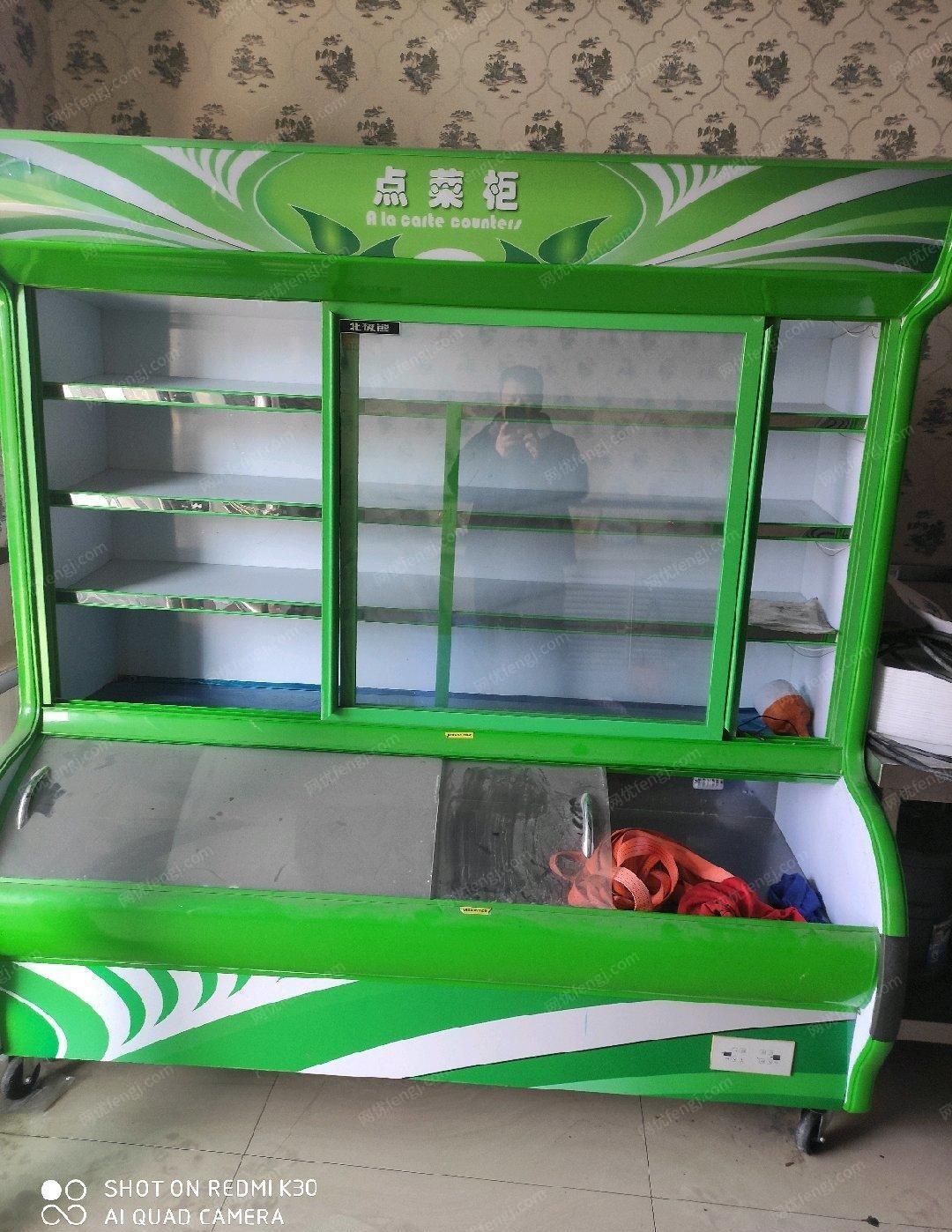 新疆乌鲁木齐99成新点菜机出售。上面冷藏下面冷冻