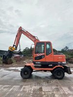 北京出售16年新源65轮式挖掘机