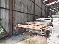 彩钢瓦厂处理17年复合板设备1套（苯板），彩钢夹芯板流水线1条，含4米120吨折弯机，4米剪板机等设备，有图片