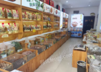 河南焦作干果货架,炒货展示柜,实木货架等设备整体出售