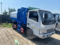 Sell 18-year-old garbage trucks with buckets