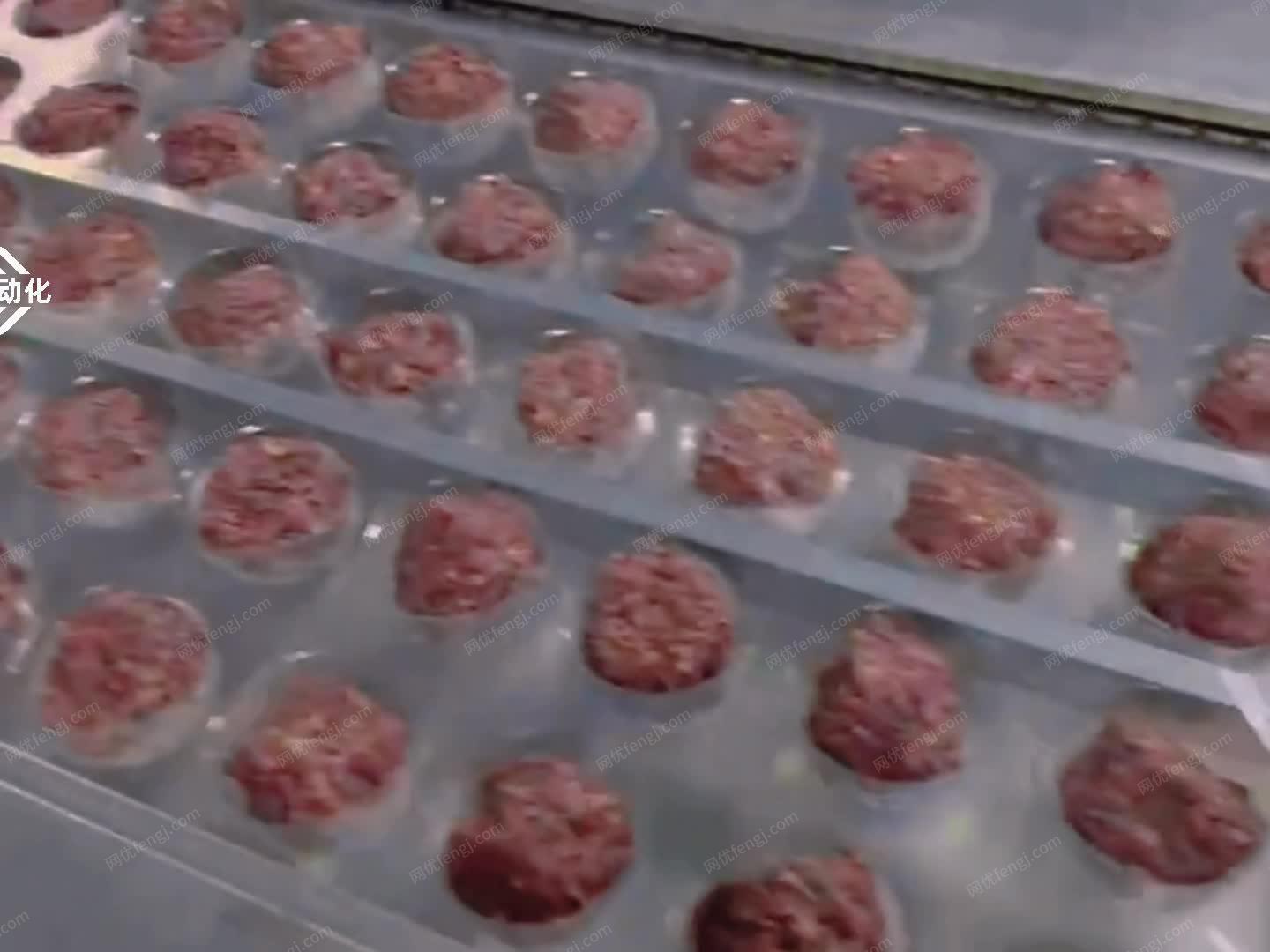 处理一台包装糙米团的二手拉伸膜真空包...